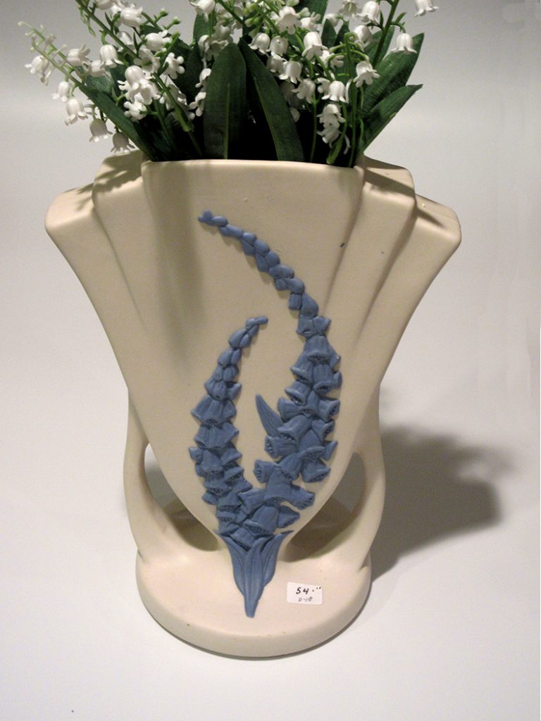 White Fan shaped vase w/2 raised Blue Agastache spires of blue-bell like flowers
