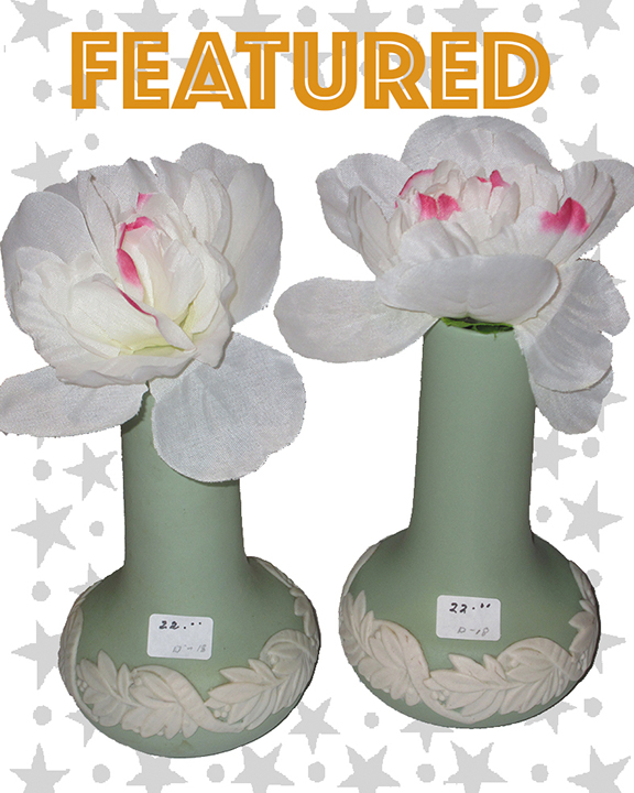 Flower Vase - Green body with bulb base encircled with band of raised white floral designs.