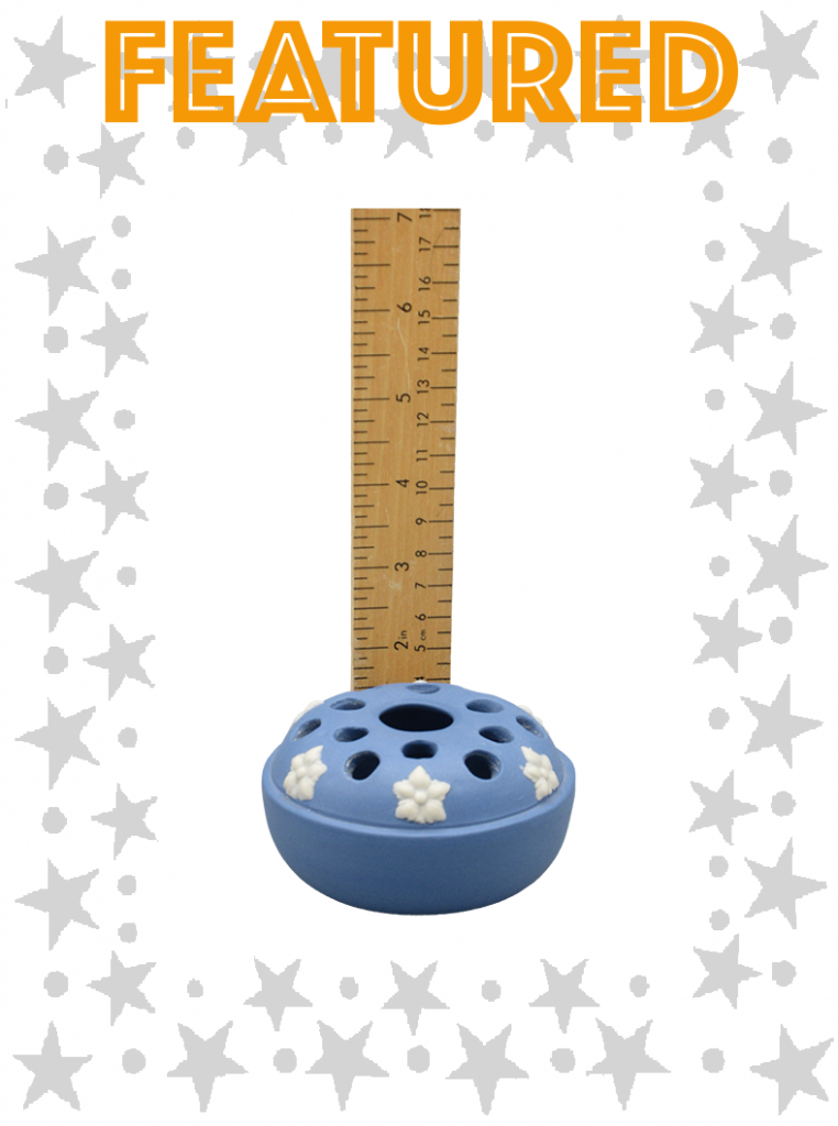 Blue with white flower motifs and holes for flower stems to be inserted to water bowl base.