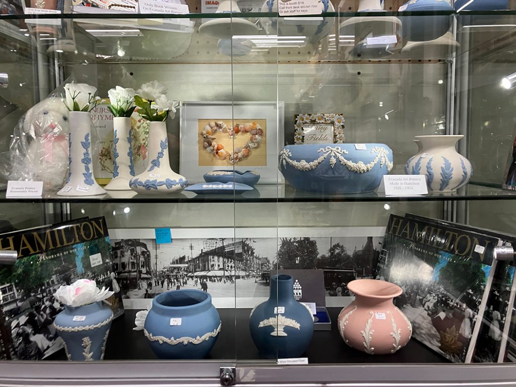 D-18 Mid shelves displaying various pottery items